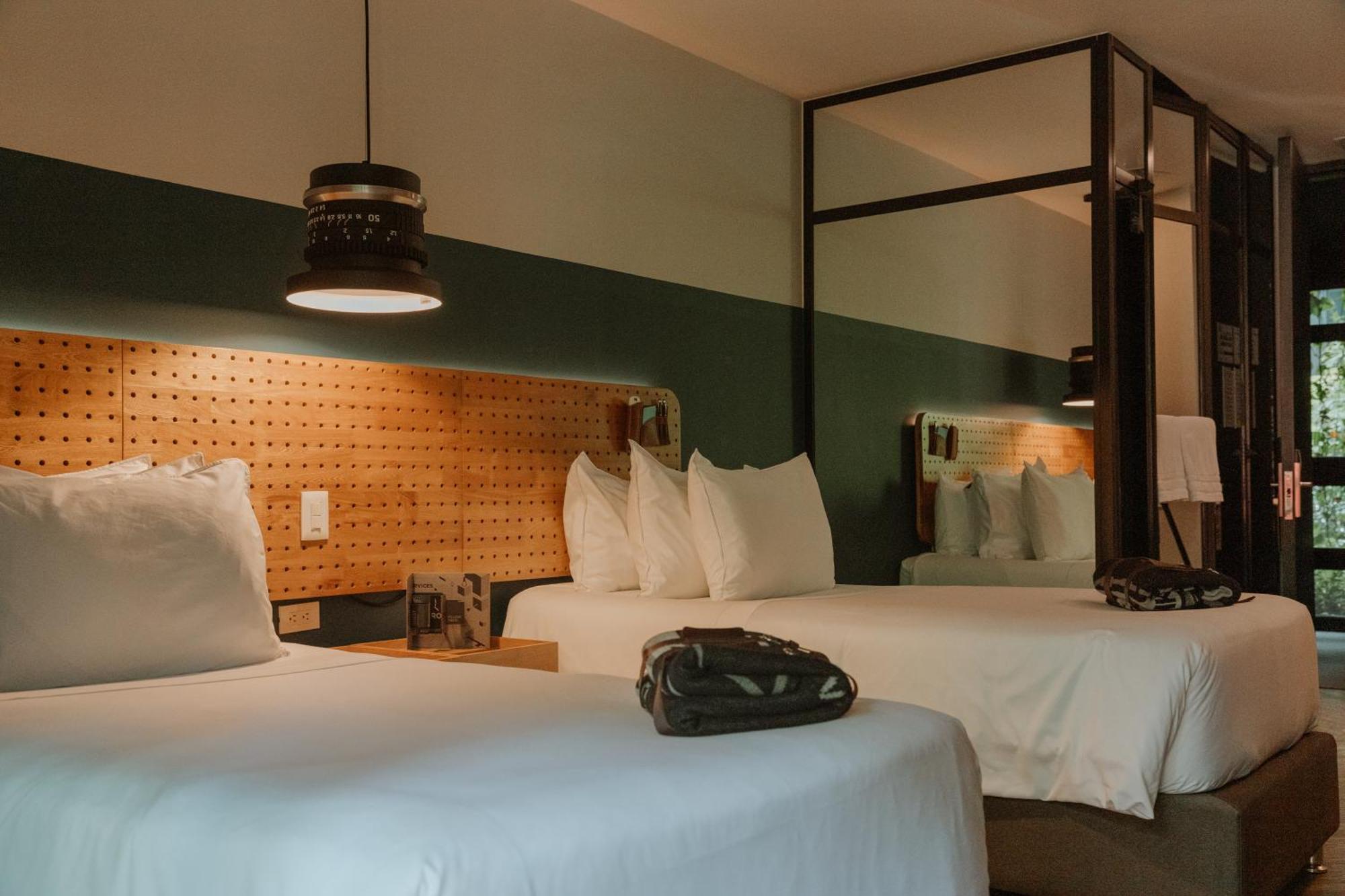 The Click Clack Hotel Medellín Kültér fotó A room at the Hotel 1728